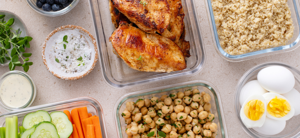 meal prepping with containers full of food