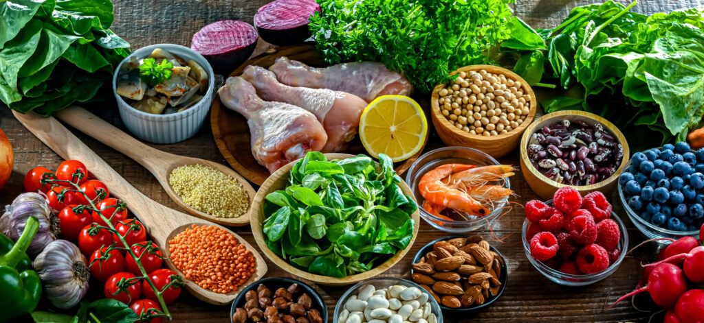 Selection of foods laid out on a table, healthy foods that are good for your visions