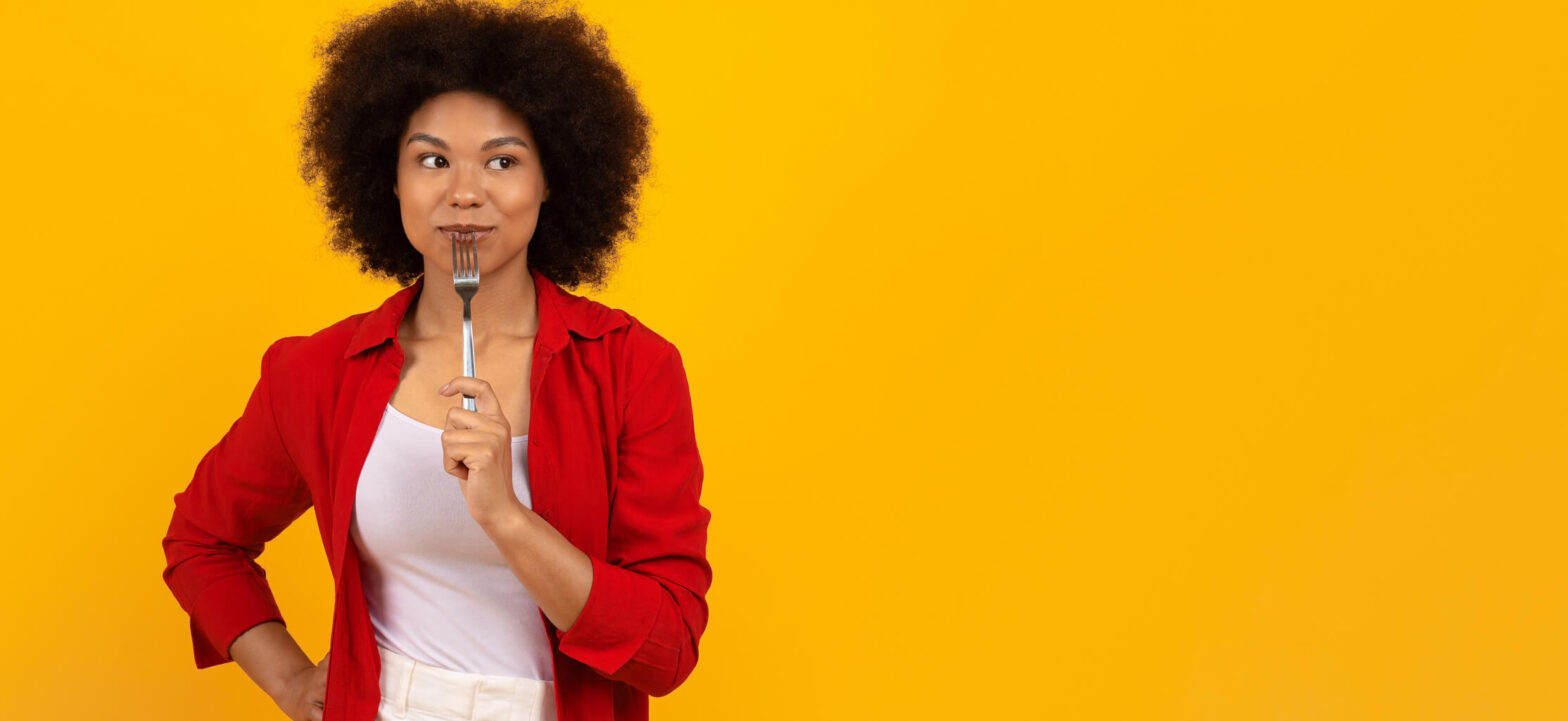 Woman thinking about food options, learning how to enjoy your food