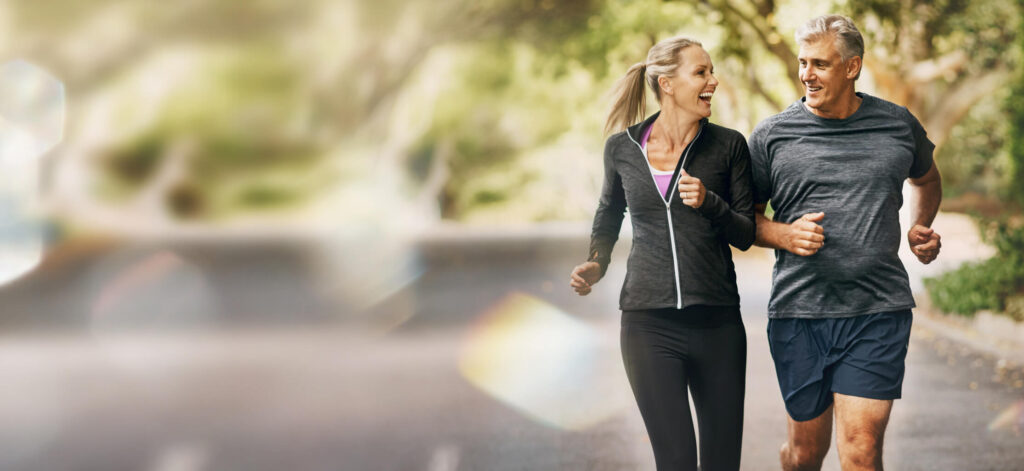 Happy couple out on a jog
