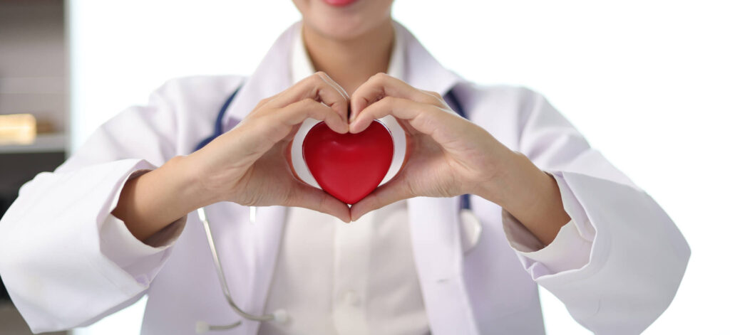 Doctor making heart hands, how kidney disease can lead to heart problems