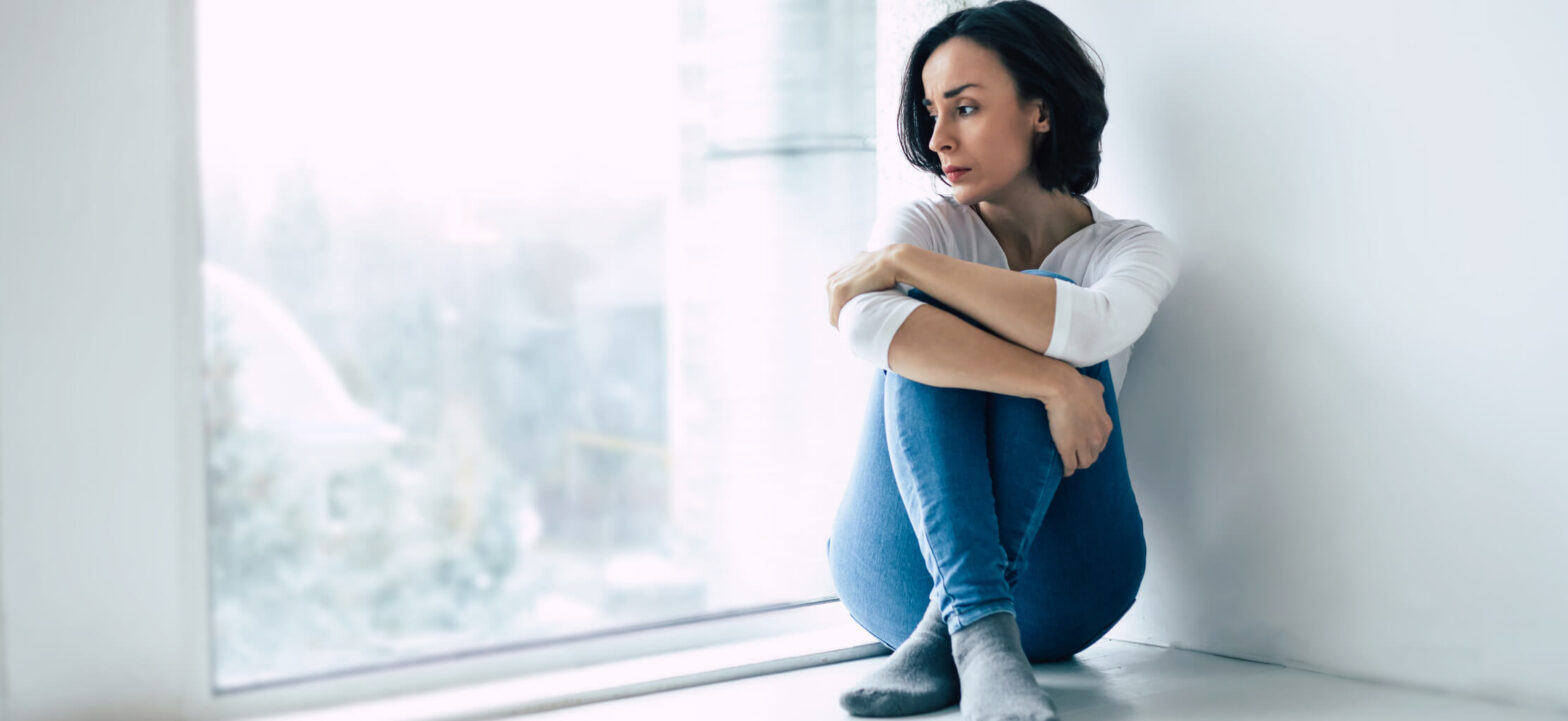 Woman feeling guilt and shame around her health choices, living with a chronic illness