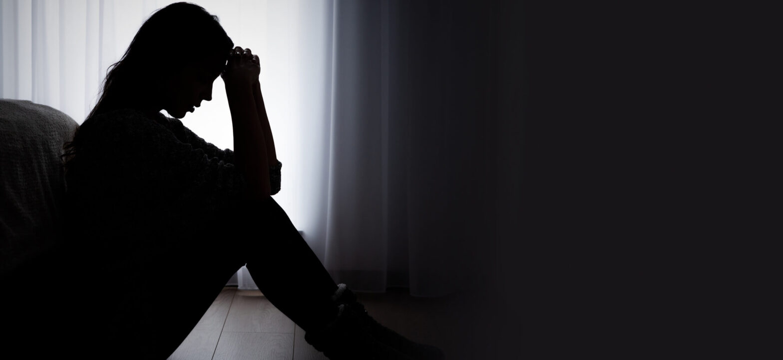 Silhouette of woman exhausted, depressed