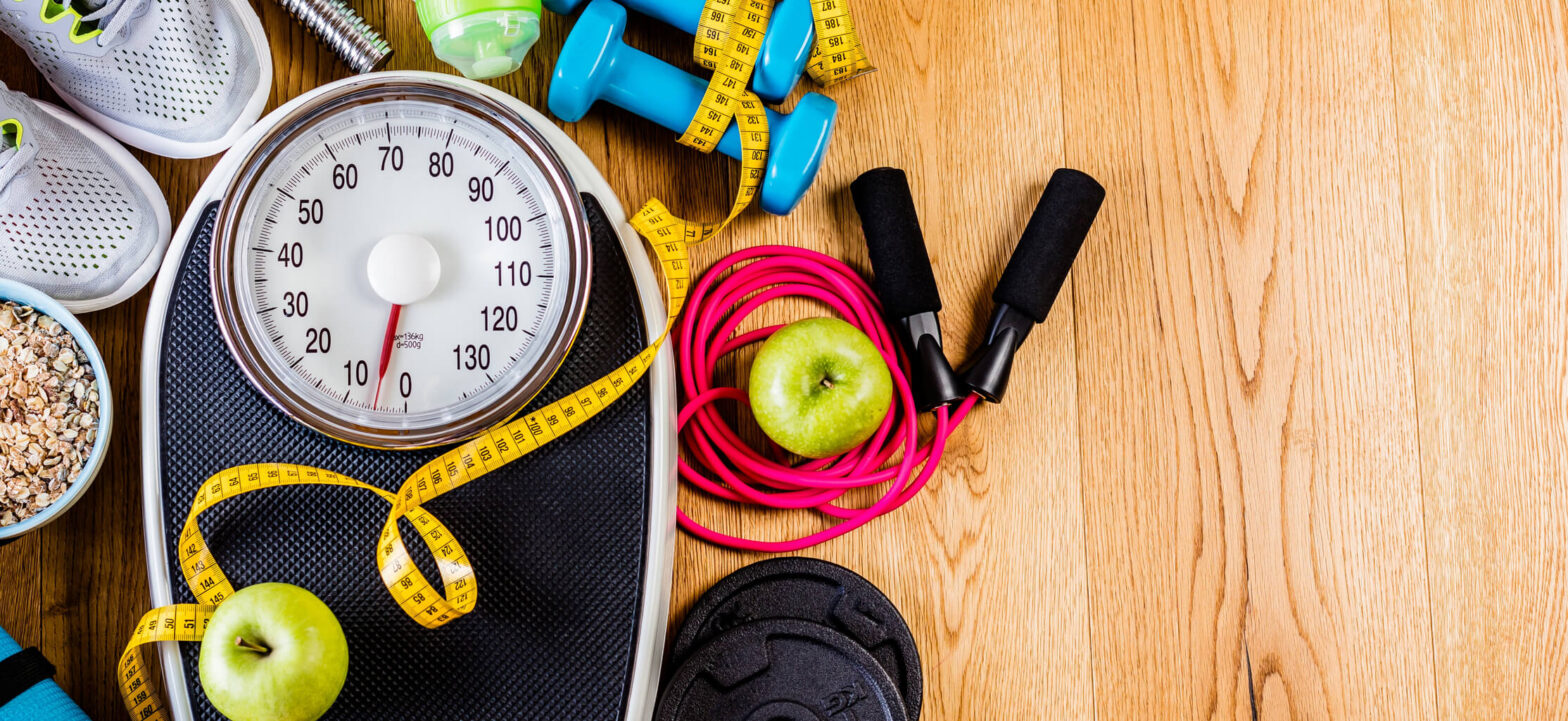 Array of weight loss equipment, gym equipment, scale.